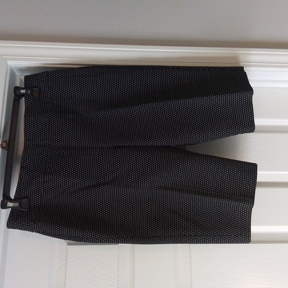Chico's black pull-on shorts. "So slimming" brand. White dotted.